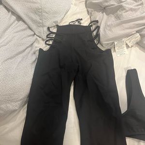 I am gia lucid top and pants in black brand new never worn tags still on